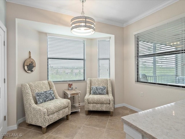 sitting room featuring light tile patterned floors, a chandelier, and crown molding