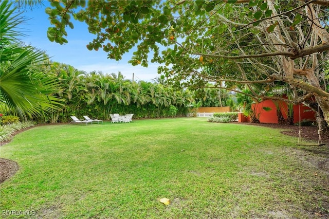 view of yard featuring fence