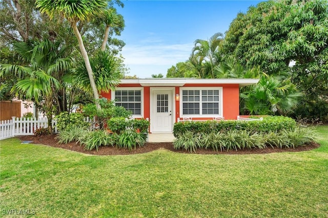 view of front of house with a front lawn