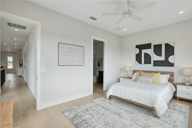 bedroom featuring ceiling fan and light hardwood / wood-style floors