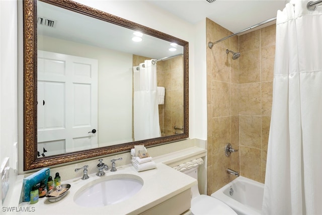 full bathroom featuring toilet, vanity, and shower / bath combo