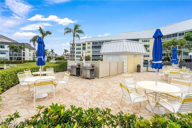 view of patio with a grill