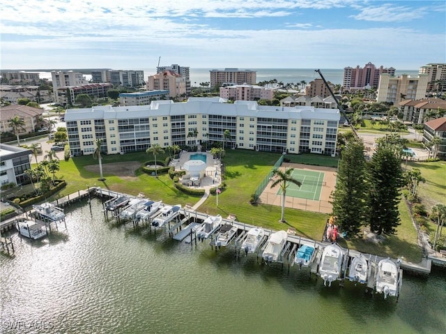 birds eye view of property featuring a water view