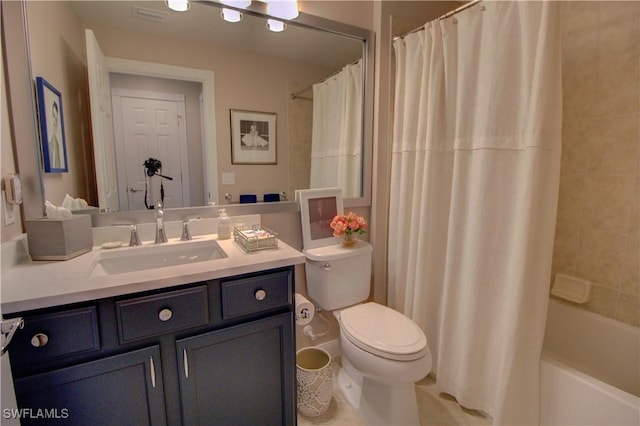 full bathroom featuring toilet, vanity, and shower / bath combo