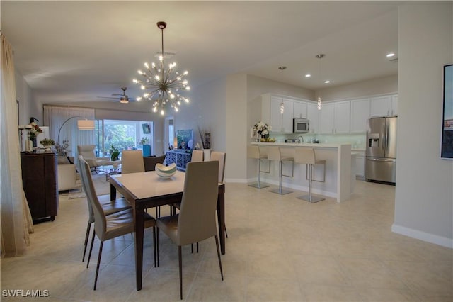 dining area with ceiling fan with notable chandelier