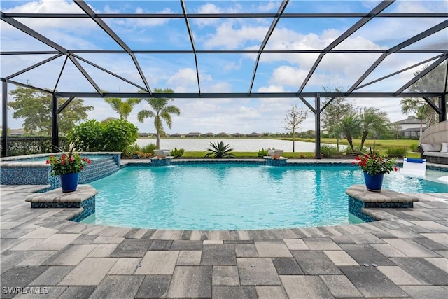 view of pool with glass enclosure, an in ground hot tub, and a patio