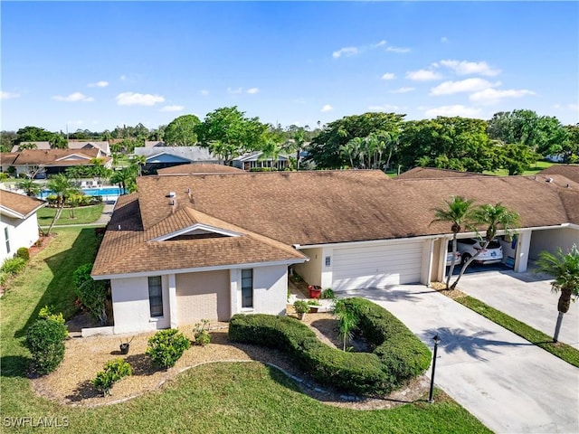 ranch-style home featuring a garage