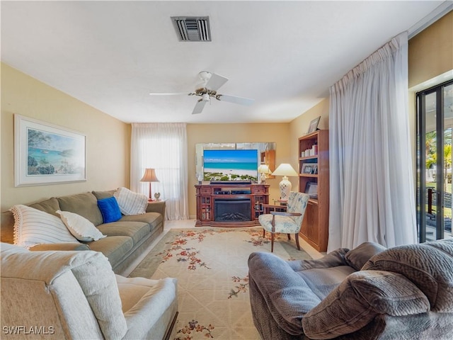 living room featuring ceiling fan