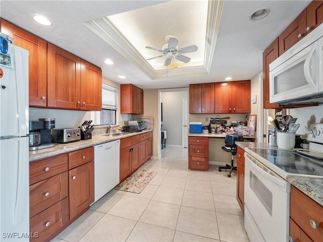 kitchen featuring sink, white appliances, a raised ceiling, ceiling fan, and crown molding