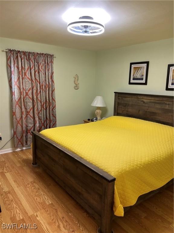 bedroom featuring hardwood / wood-style floors