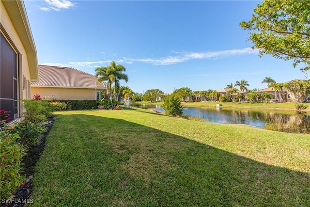 view of yard with a water view