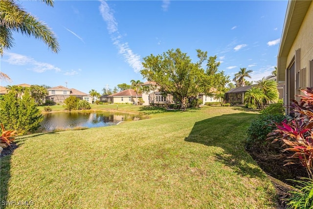 view of yard featuring a water view