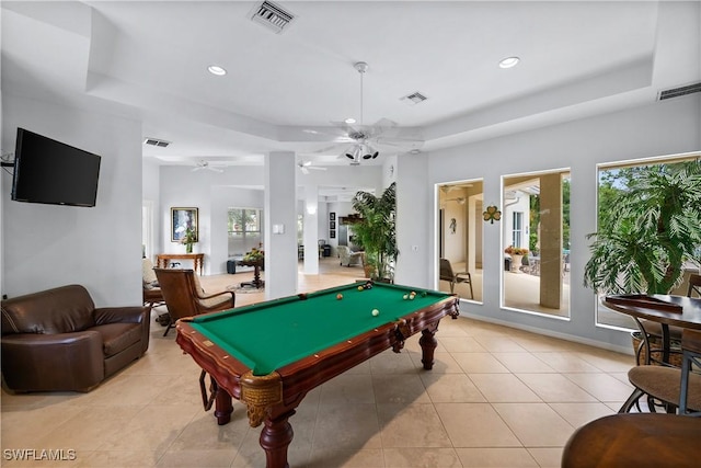 rec room featuring ceiling fan, a raised ceiling, billiards, and light tile patterned floors