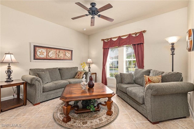 tiled living room with ceiling fan