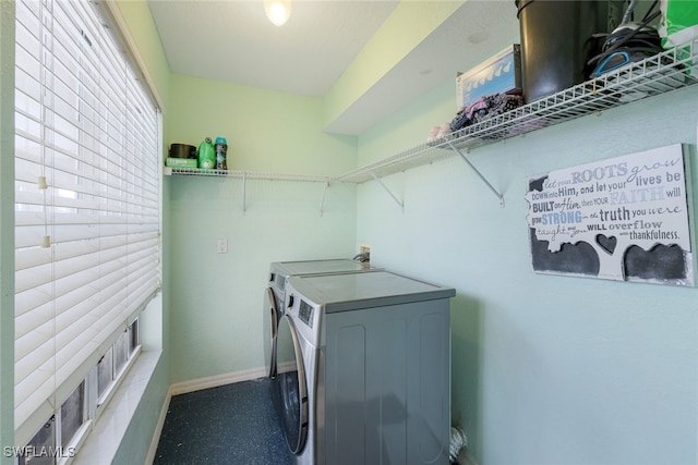 clothes washing area featuring washing machine and dryer