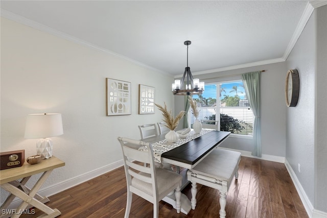 dining area with a notable chandelier, ornamental molding, and dark hardwood / wood-style flooring