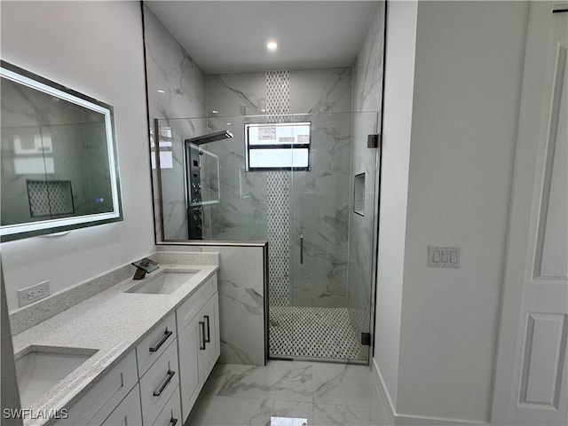 bathroom with recessed lighting, marble finish floor, a sink, a marble finish shower, and double vanity