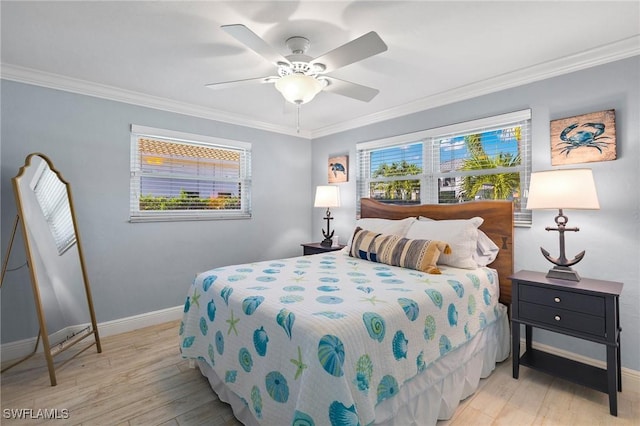 bedroom with ceiling fan, light hardwood / wood-style floors, and crown molding