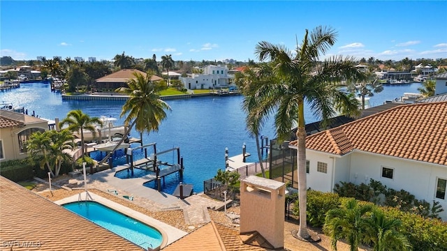 property view of water with a dock