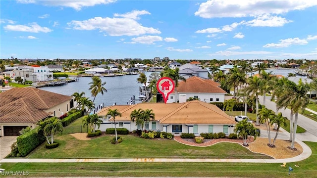 drone / aerial view with a water view