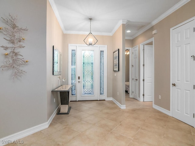 foyer featuring ornamental molding