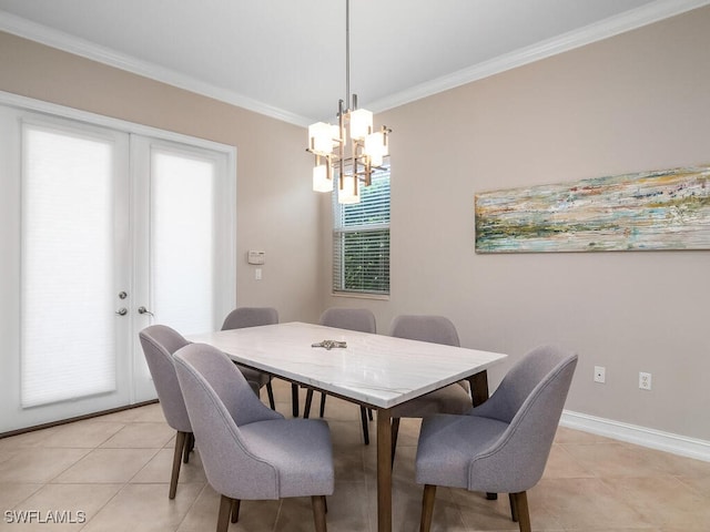 dining room featuring light tile patterned floors, a notable chandelier, ornamental molding, and french doors