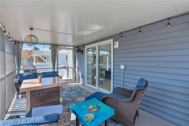 sunroom / solarium featuring a healthy amount of sunlight