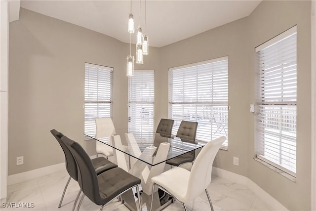 dining area with a healthy amount of sunlight