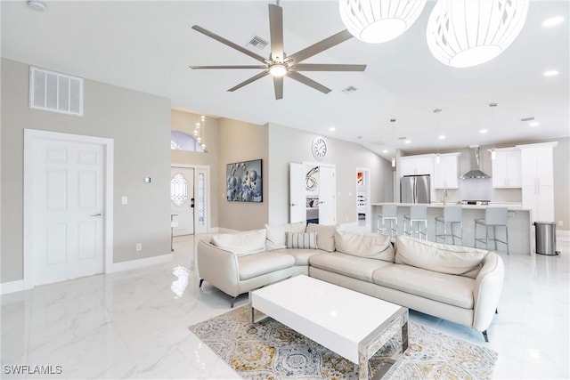 living room with ceiling fan