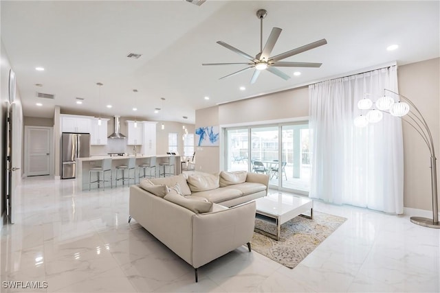 living room featuring ceiling fan