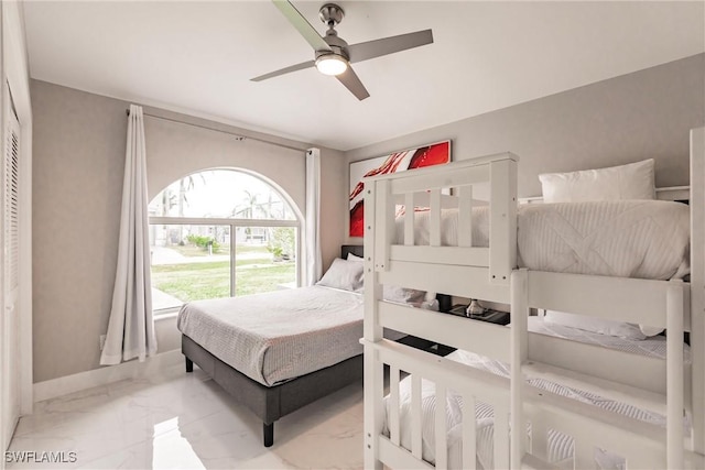 bedroom featuring ceiling fan