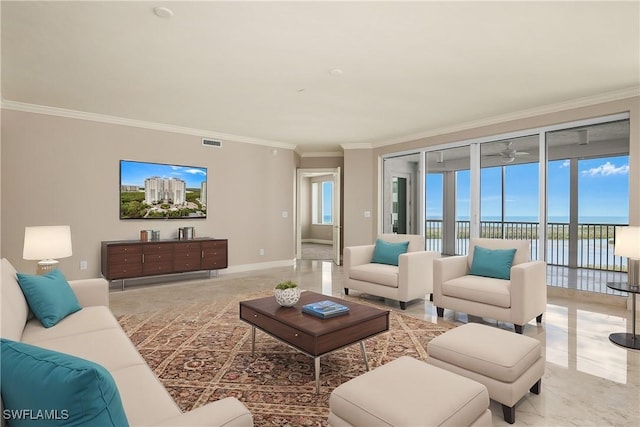 living room featuring crown molding