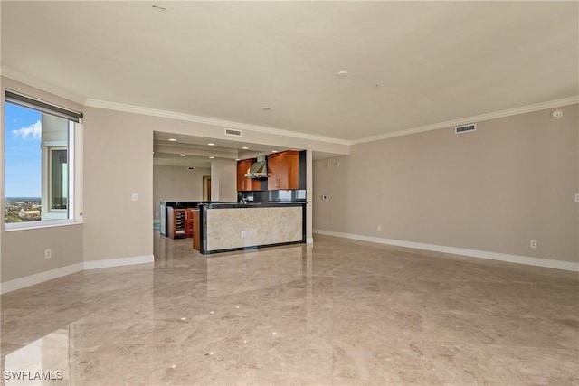 unfurnished living room featuring crown molding