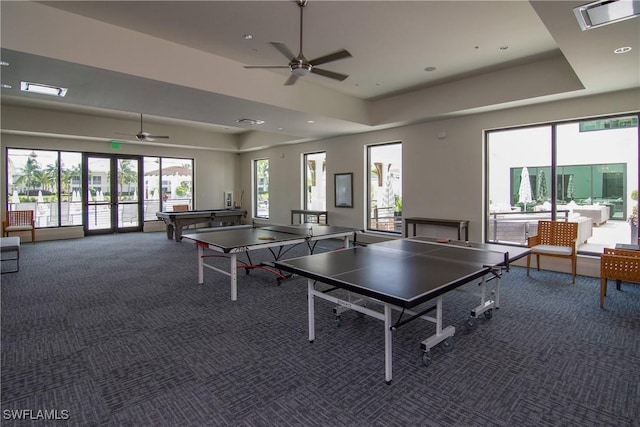 game room featuring ceiling fan, carpet, pool table, and a raised ceiling