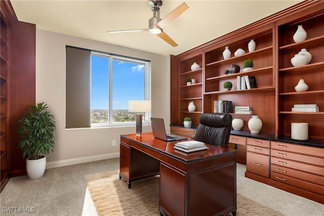 office space with ceiling fan and carpet flooring