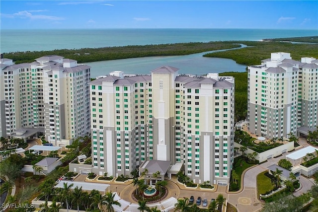 birds eye view of property featuring a water view