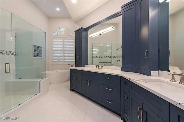 bathroom with plus walk in shower and vanity