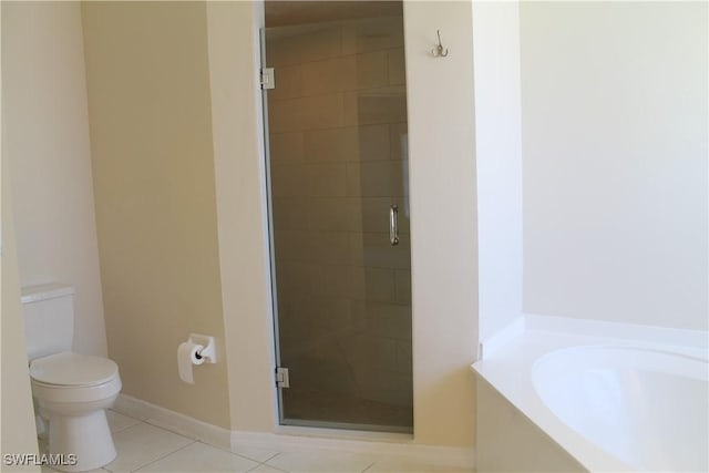 bathroom with toilet, shower with separate bathtub, and tile patterned floors