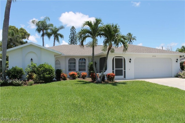 ranch-style house with a front yard and a garage