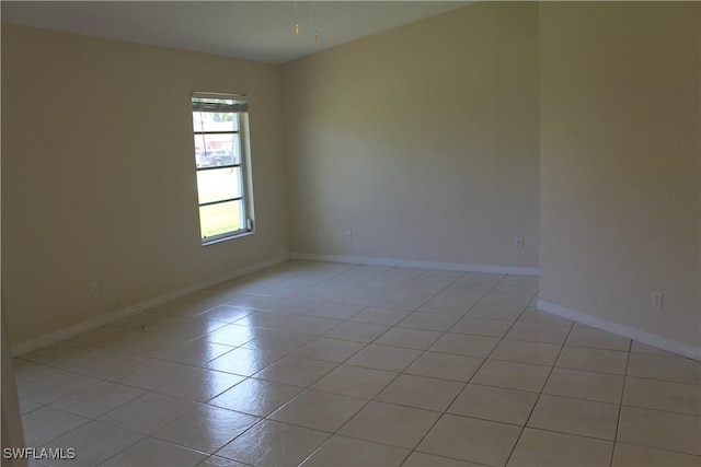 view of tiled spare room