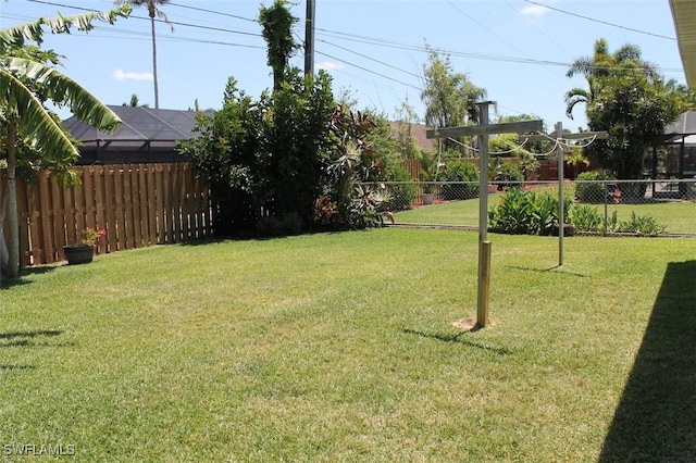 view of yard featuring a lanai