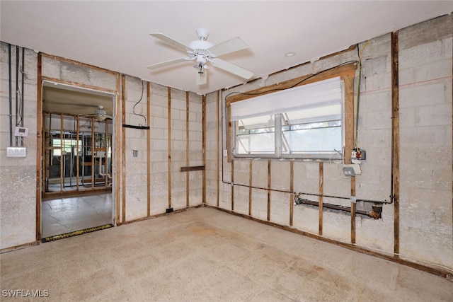 basement featuring ceiling fan