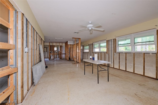 interior space featuring ceiling fan