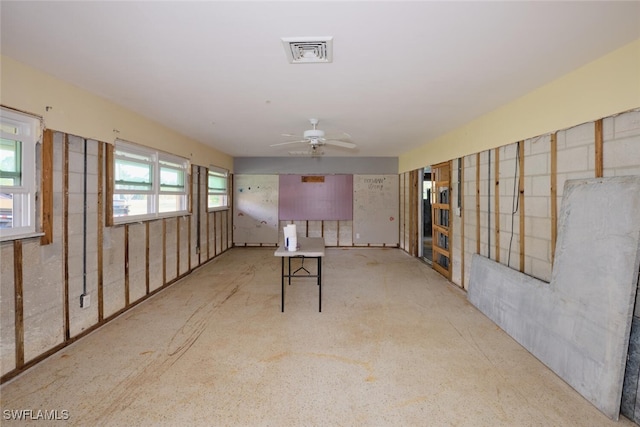 basement with ceiling fan