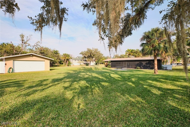 view of yard with an outdoor structure