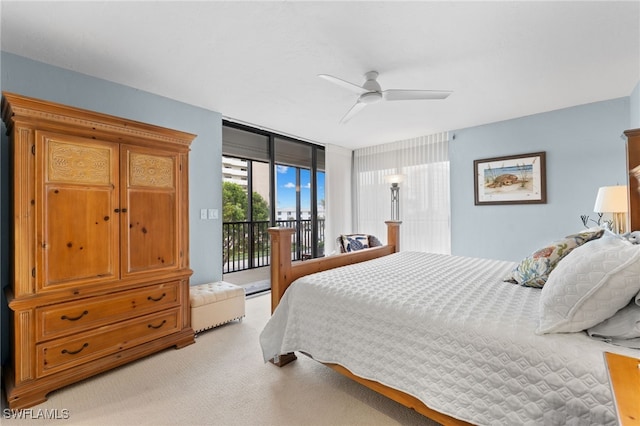 bedroom with light carpet, access to exterior, and ceiling fan