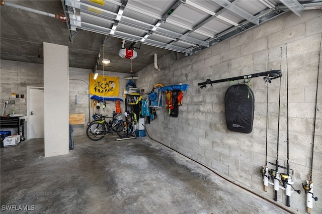 garage featuring a garage door opener