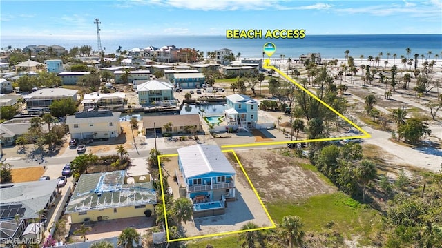 261 Donora Blvd, Fort Myers Beach, FL 33931 - aerial view of property and surrounding area with property parcel outlined and a large body of water