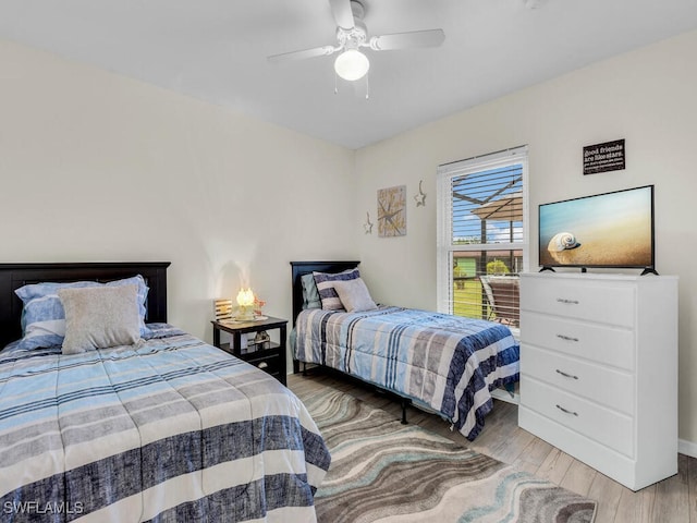 bedroom featuring ceiling fan and hardwood / wood-style floors