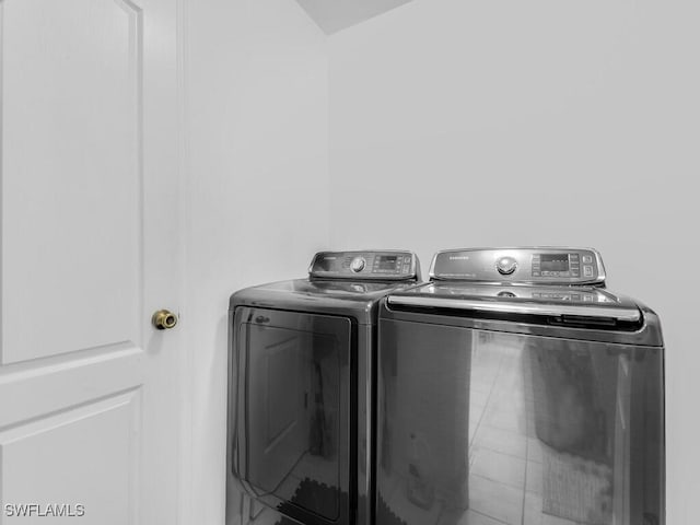 laundry room with washer and dryer